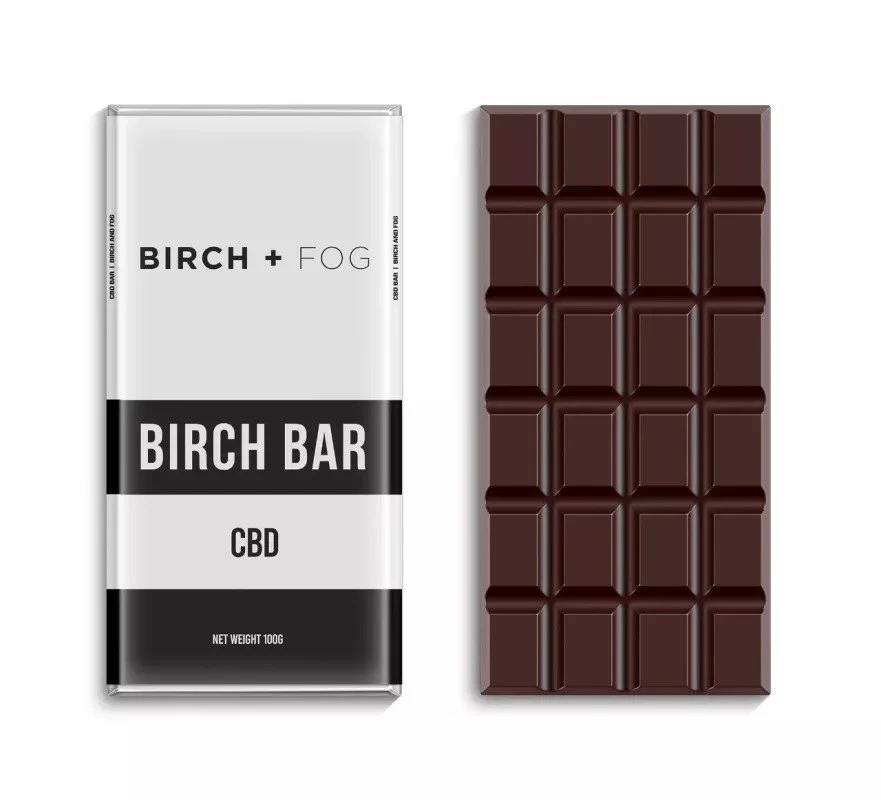 Birch Bar CBD Chocolate CBD-infused chocolate bar packaging and chocolate pieces