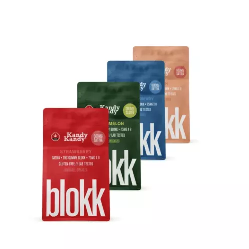 Four colorful candy packaging pouches in various flavors.